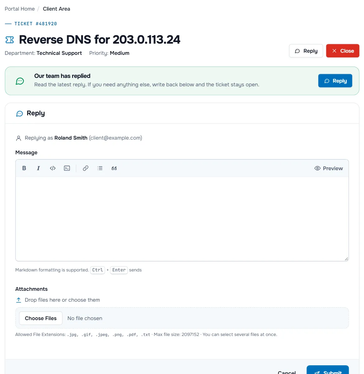 A ticket with its number, subject, department and priority, the Reply and Close buttons, the banner Our team has replied and the reply box with formatting toolbar and attachments